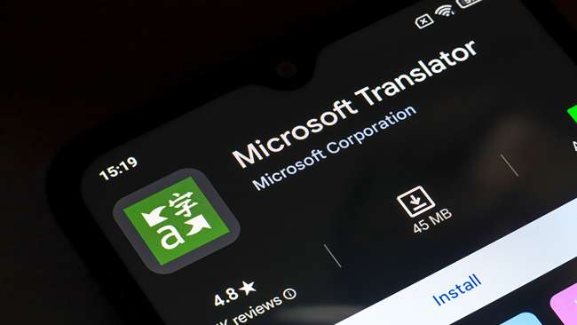 iPhone screens displaying translation app with voice input and split-screen translation interface.